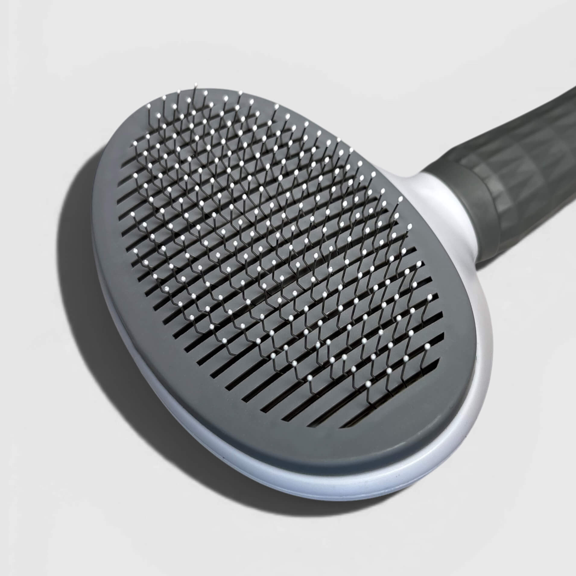 selbstreinigende Hunde- und Katzenbürste für langes Fell